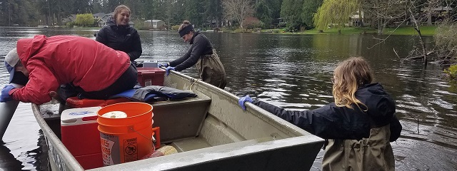 UW SRP Center researchers collect water samples from Lake Killarney, a well-mixed shallow lake in the study.